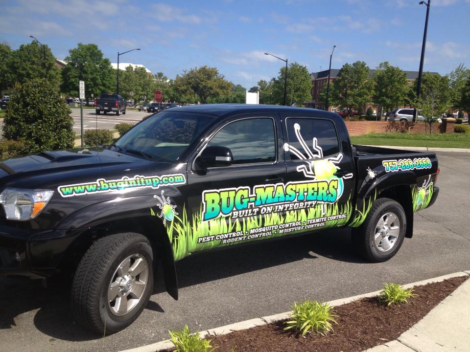 Bug-Masters LLC service truck providing pest control in Virginia Beach, VA
